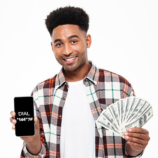 A smiling customer holding a phone that shows Dial *144*7#
